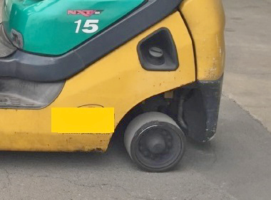 close-look-exhausted-forklift-rear-tyre